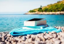 image of books at the beach