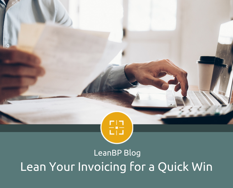 image of office worker handling invoices